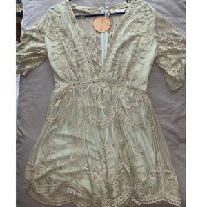 Lace romper, plunging neck line